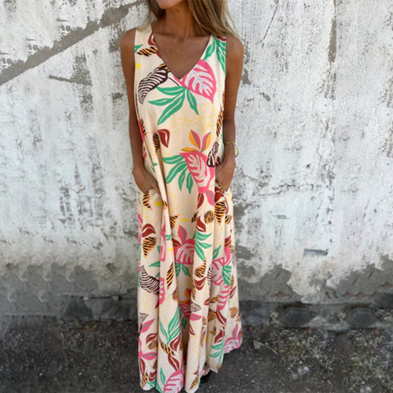 YLVA I MAXIKLEID MIT V-AUSSCHNITT